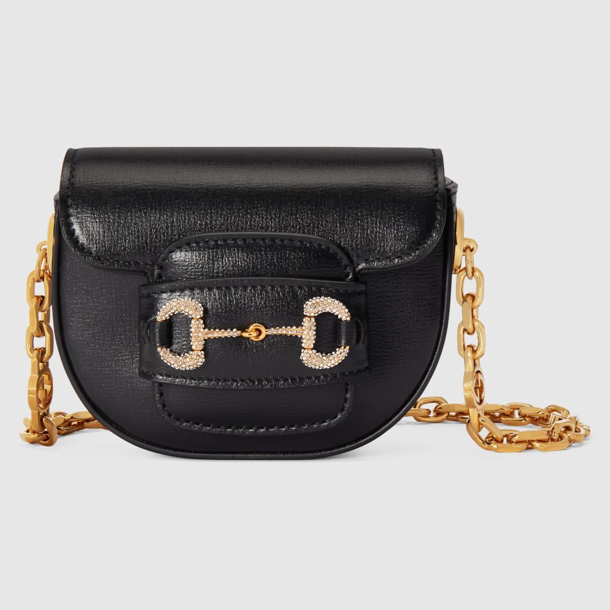 <p><a href="https://go.redirectingat.com?id=74968X1596630&url=https%3A%2F%2Fwww.gucci.com%2Fus%2Fen%2Fpr%2Fwomen%2Fhandbags%2Fbackpacks-belt-bags-for-women%2Fgucci-horsebit-1955-rounded-belt-bag-p-764504AACSV1155&sref=https%3A%2F%2Fwww.townandcountrymag.com%2Fstyle%2Ffashion-trends%2Fg60502891%2Fbest-designer-belt-bags%2F" rel="nofollow noopener" target="_blank" data-ylk="slk:Shop Now;elm:context_link;itc:0;sec:content-canvas" class="link rapid-noclick-resp">Shop Now</a></p><p>Horsebit 1955 Rounded Belt Bag</p><p>gucci.com</p><p>$3600.00</p>