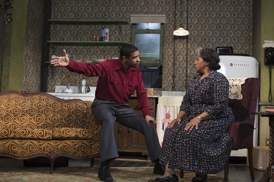 This image released by Philip Rinaldi Publicity shows Denzel Washington, left, and LaTanya Richardson Jackson during a performance of "A Raisin in the Sun," at the Ethel Barrymore Theatre in New York. (AP Photo/Philip Rinaldi Publicity, Brigitte Lacombe)