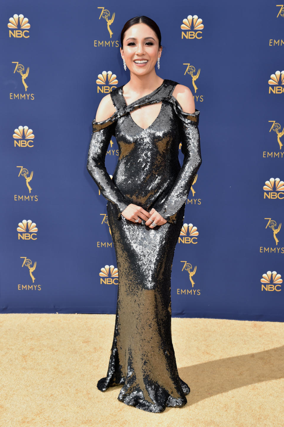 In a Jason Wu gown on the Emmys red carpet.