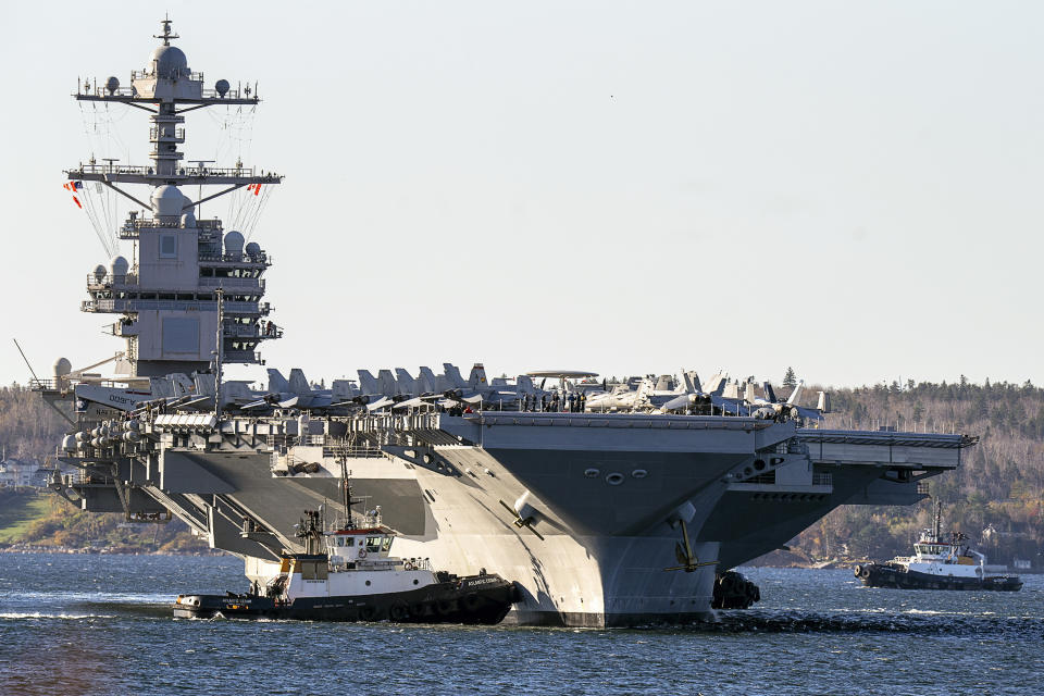 FILE - The USS Gerald R. Ford, one of the world's largest aircraft carriers, arrives in Halifax on Oct. 28, 2022. The Pentagon has ordered the Ford carrier strike group to sail to the Eastern Mediterranean to be ready to assist Israel, two U.S. officials said Sunday, Oct. 8, 2023. The USS Gerald R. Ford and its approximately 5,000 sailors and deck of warplanes will be accompanied by cruisers and destroyers in a show of force that is meant to be ready to respond to anything, from possibly interdicting additional weapons from reaching Hamas and conducting surveillance. (Andrew Vaughan/The Canadian Press via AP, File)