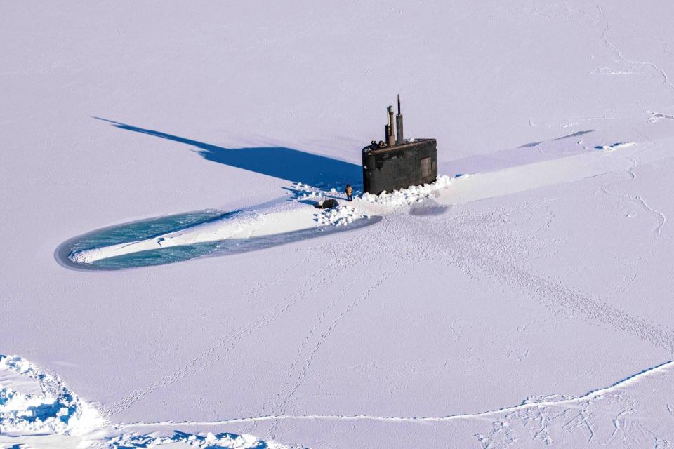 The <em>Los Angeles</em> class fast-attack submarine USS Pasadena (SSN 752) breaks through the ice in ICEX, which happened concurrently with Arctic Edge 2022, March 12, 2022. <em>U.S. Navy Photo by Mass Communication Specialist 2nd Class Trey Hutcheson</em>