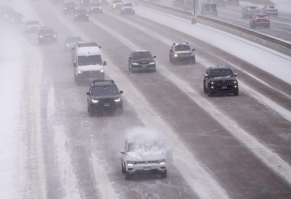 With the daytime high temperature in negative far below zero, a handful of motorists head southbound on Interstate 25 near the Steele Street overpass Monday, Jan. 15, 2024, in Denver. Forecasters predict that the frigid weather will persist until midweek in the intermountain West. (AP Photo/David Zalubowski)