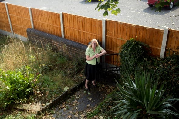 Trapped by neighbour's fence