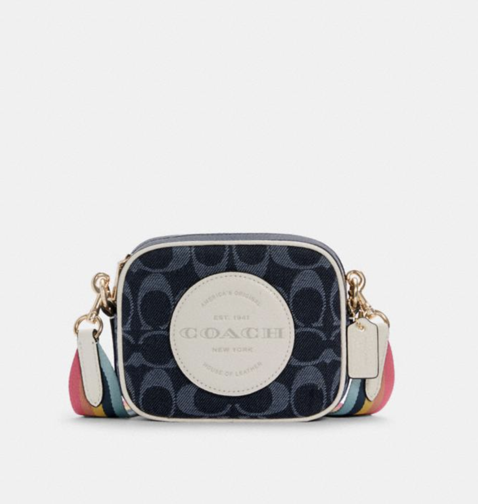 Mini Dempsey Camera Bag in Denim/Multi (Photo via Coach Outlet)