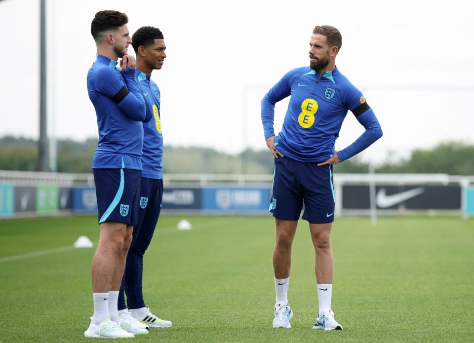 Henderson (right) says playing for England was his biggest dream and that will never change (The FA via Getty Images)