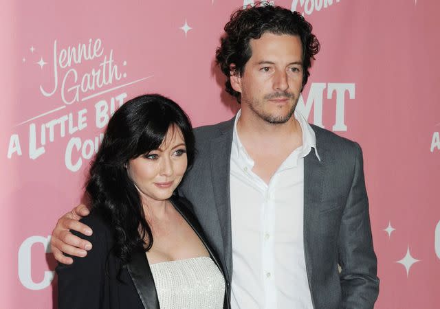 <p>Jeffrey Mayer/WireImage</p> Shannen Doherty and Kurt Iswarienko arrive at her 40th Birthday celebration & premiere party for 'Jennie Garth: A Little Bit Country' on April 19, 2012 in West Hollywood, California.