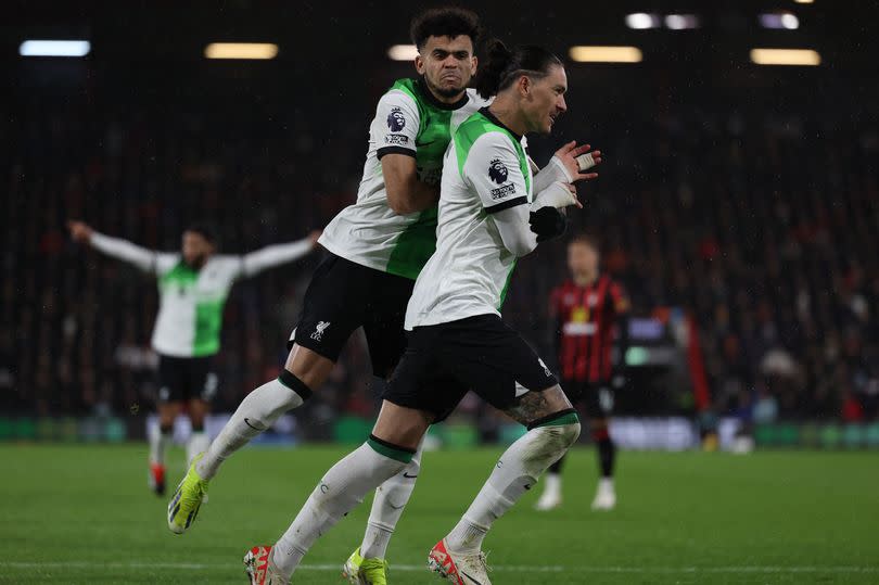 Darwin Núñez (R) with Luis Díaz (C) after scoring the opening goal of the English Premier League football match between Bournemouth and Liverpool at the Vitality Stadium in Bournemouth, southern England on January 21, 2024.