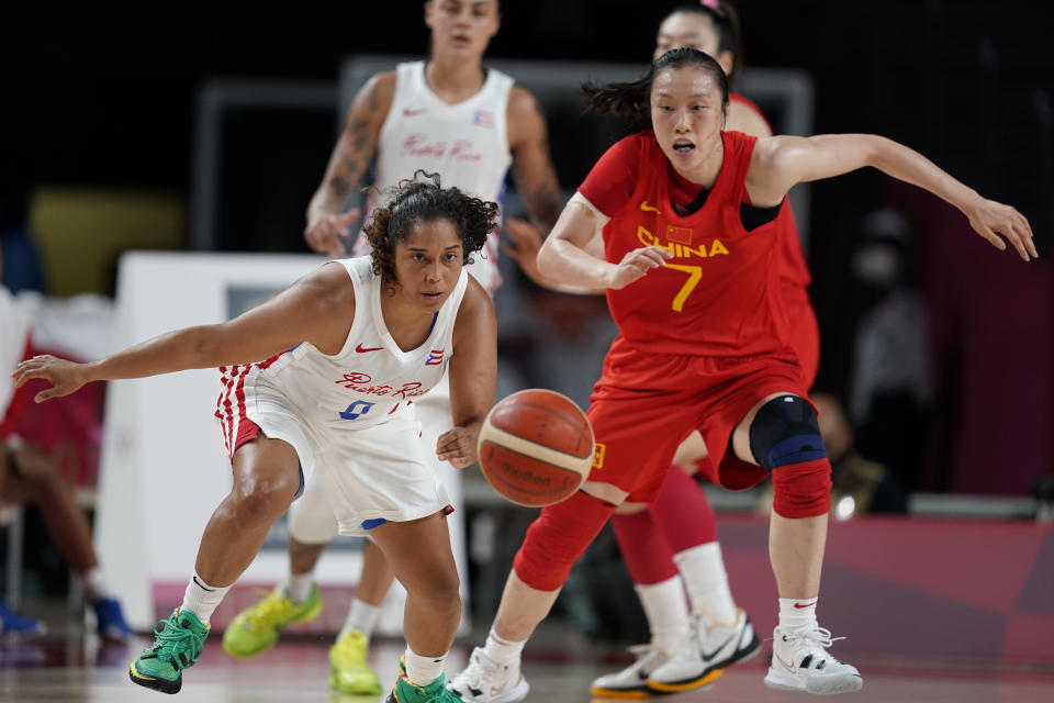 Puerto Rico's Jennifer O'Neill (0) and China's Ting Shao (7) chase a loose ball during a women's basketball preliminary round game at the 2020 Summer Olympics in Saitama, Japan, Tuesday, July 27, 2021. (AP Photo/Charlie Neibergall)