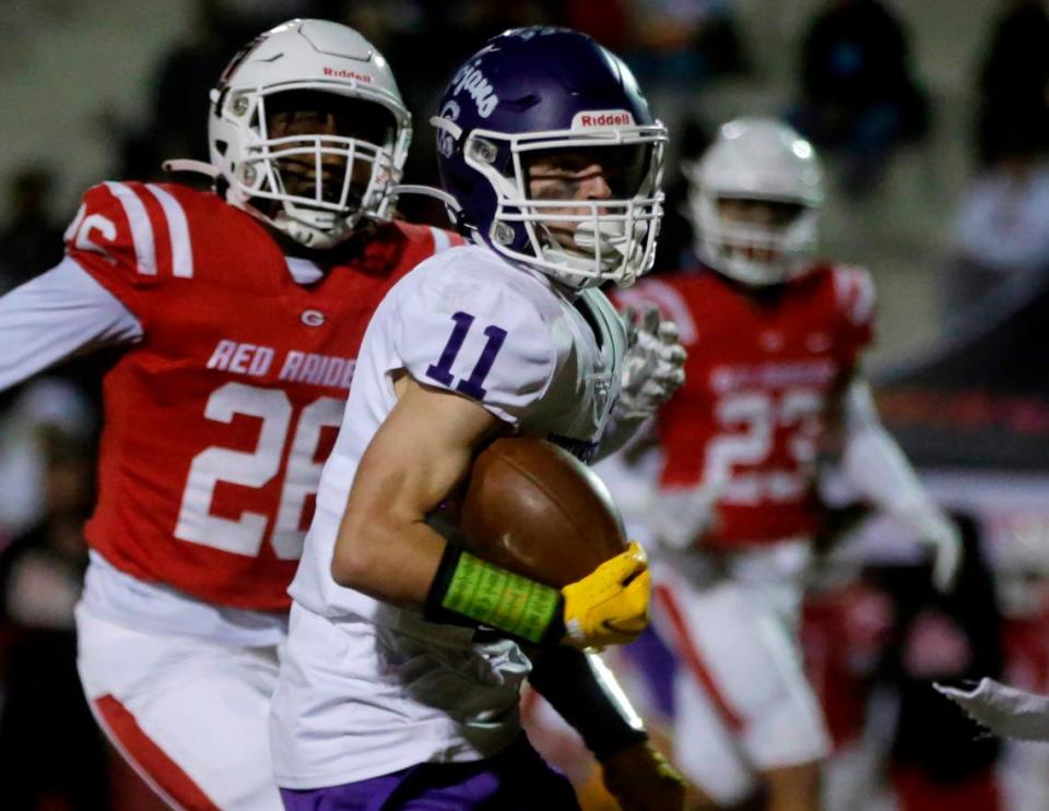 Northwestern’s Greer Hopkins (11) carries the ball Friday at the Class 4A Upperstate Championship game against Greenville High School in Greenville, S.C.