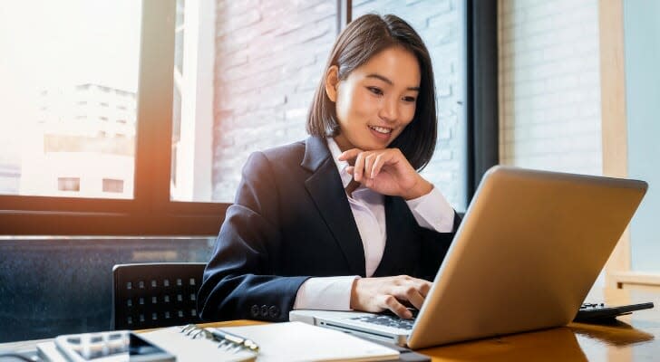 An investor at her desk