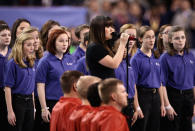 INDIANAPOLIS, IN - FEBRUARY 05: Singer Kelly Clarkson performs the national anthem before before the start of Super Bowl XLVI at Lucas Oil Stadium on February 5, 2012 in Indianapolis, Indiana. (Photo by Win McNamee/Getty Images)