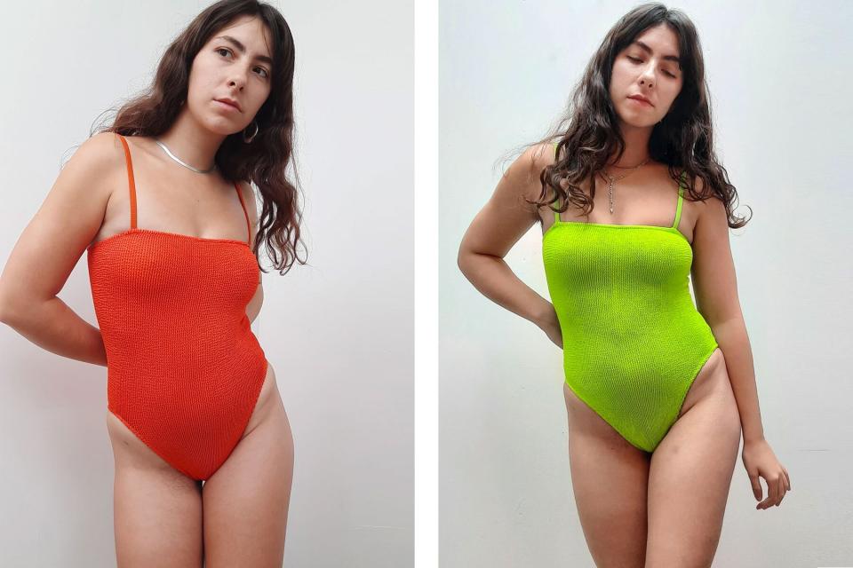 Women wearing red and lime green one piece swimsuits