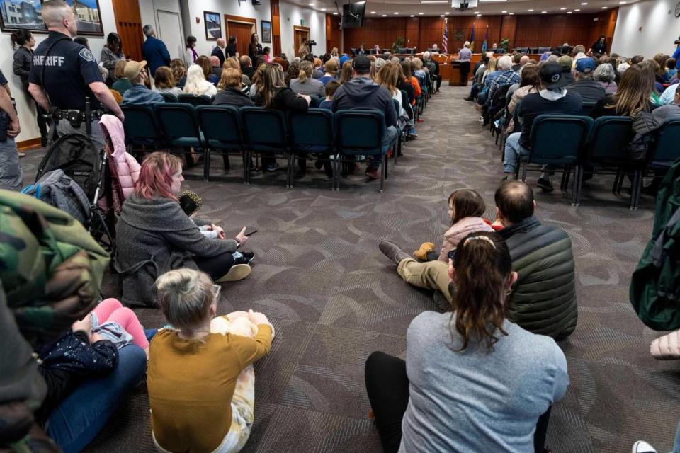 The Ada County Courthouse had two of its largest meeting rooms full of people listening and waiting to testify during a public hearing on the petition.