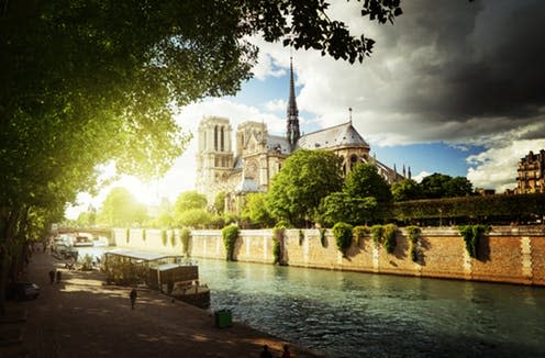 <span class="caption">The Seine and Notre Dame, physically and spiritually the heart of Paris.</span> <span class="attribution"><span class="source">Iakov Kalinin via Shutterstock</span></span>