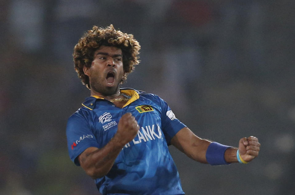 Sri Lanka's captain Lasith Malinga celebrates the dismissal of West Indies' batsman Dwayne Smith during their ICC Twenty20 Cricket World Cup semi-final match in Dhaka, Bangladesh, Thursday, April 3, 2014. (AP Photo/Aijaz Rahi)