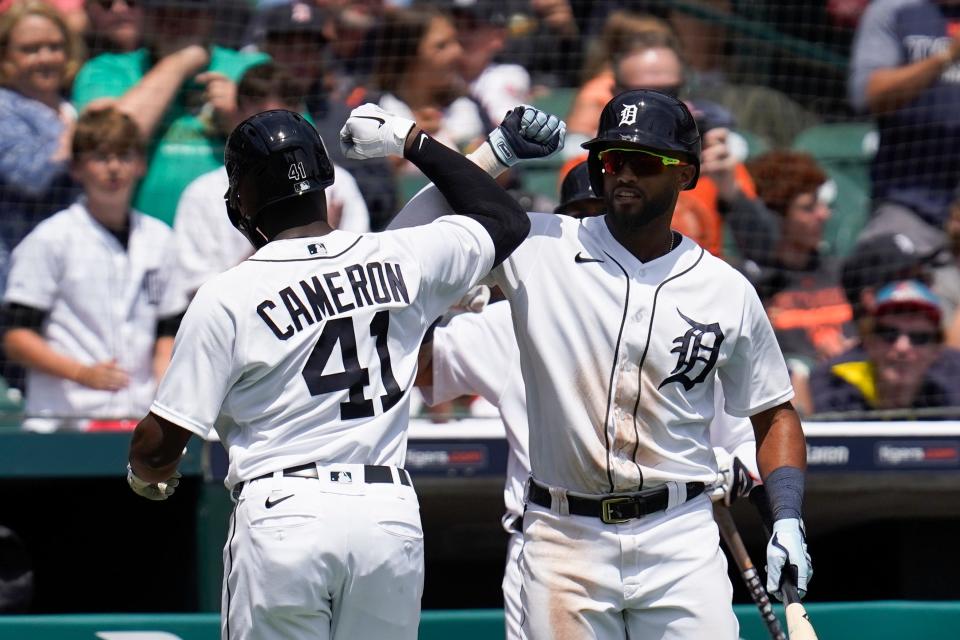 Detroit Tigers' Daz Cameron (41) celebrates his solo home run with Willi Castro against the St. Louis Cardinals in the fourth inning of a baseball game in Detroit, Wednesday, June 23, 2021.
