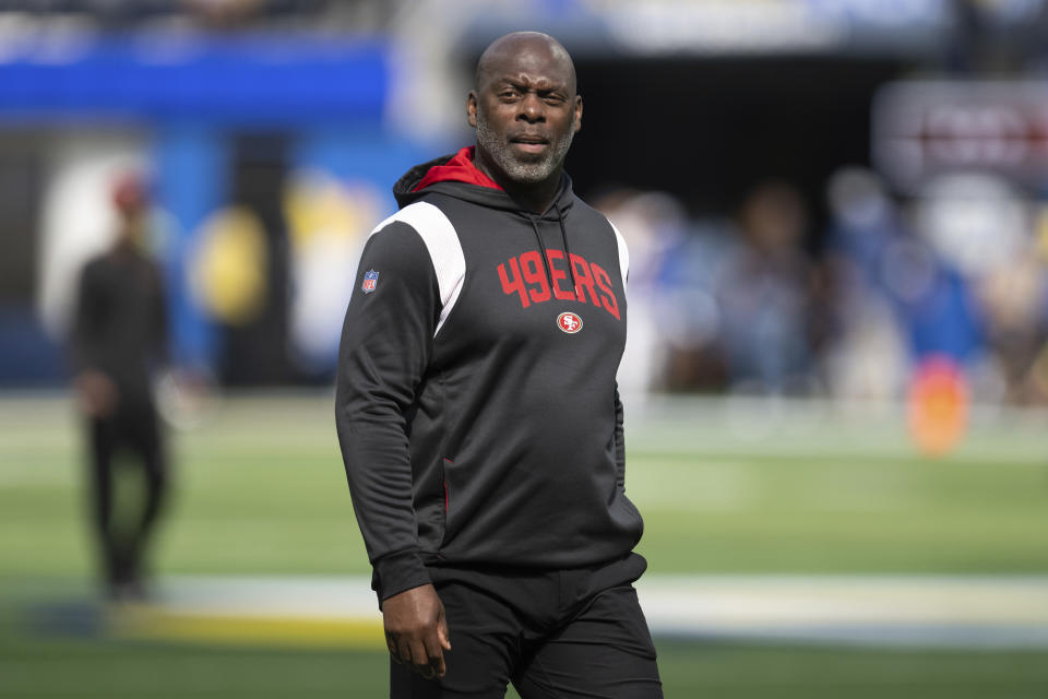 FILE - San Francisco 49ers assistant head coach Anthony Lynn walks on the field during an NFL football game against the Los Angeles Rams on Oct. 30, 2022, in Inglewood, Calif. The Washington Commanders said Wednesday, Feb. 1, 2023, that they are interviewing Lynn for their offensive coordinator vacancy. (AP Photo/Kyusung Gong, File)