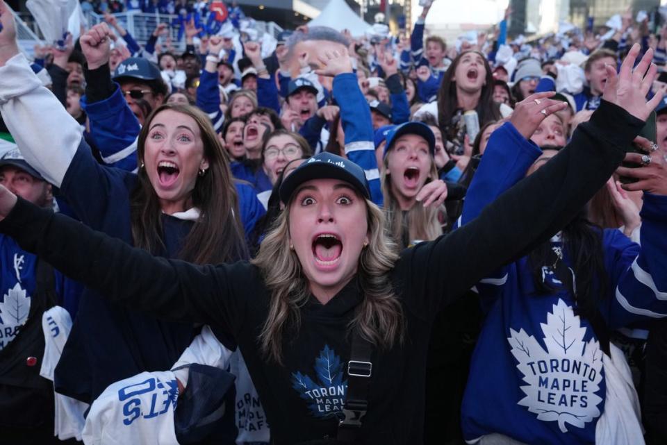  Fans in Toronto celebrate a goal during a Maple Leafs playoff game.