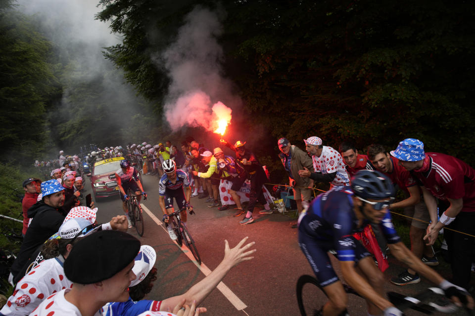 France's David Gaudu is followed by France's Julian Alaphilippe, center, and Latvia's Krists Neilands, left, during the fifth stage of the Tour de France cycling race over 163 kilometers (101 miles) with start in Pau and finish in Laruns, France, Wednesday, July 5, 2023. (AP Photo/Daniel Cole)