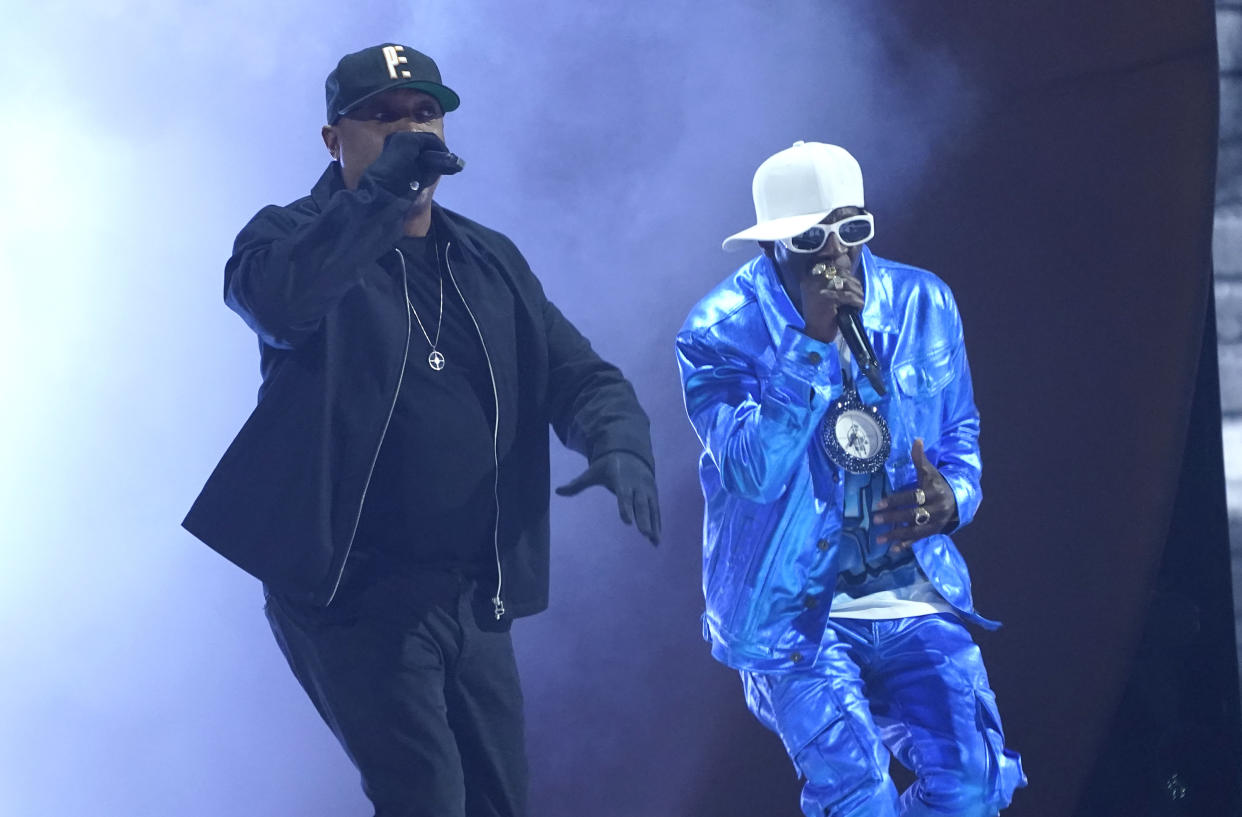 Chuck D, left, and Flavor Flav perform "Rebel Without a Pause" at the 65th annual Grammy Awards on Sunday, Feb. 5, 2023, in Los Angeles. (AP Photo/Chris Pizzello)