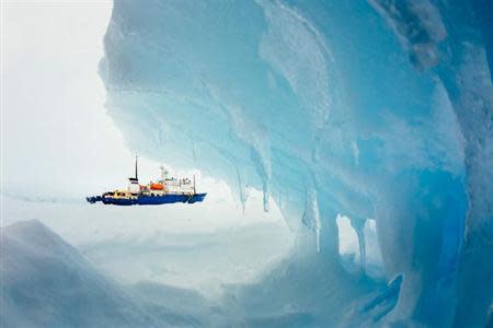 The MV Akademik Shokalskiy is pictured stranded in ice in Antarctica, December 29, 2013. REUTERS/Andrew Peacock