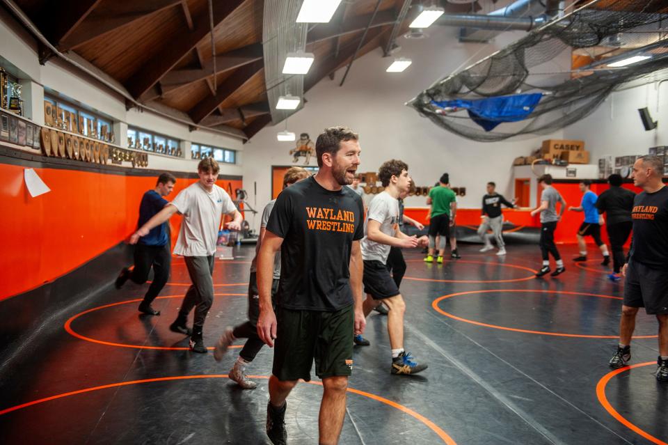 Wayland High School wrestling coach Sean Chase at practice, Dec. 23, 2022.