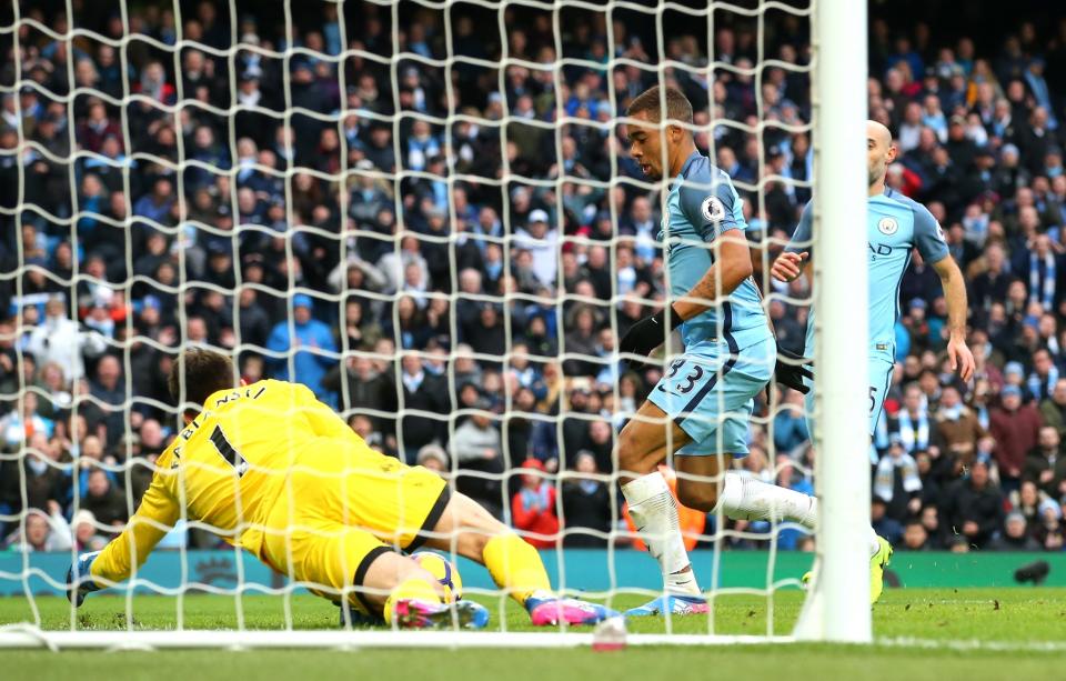 <p>Gabriel Jesus of Manchester City scores his sides second goal during the Premier League match between Manchester City and Swansea City at Etihad Stadium on February 5, 2017 in Manchester, England. </p>