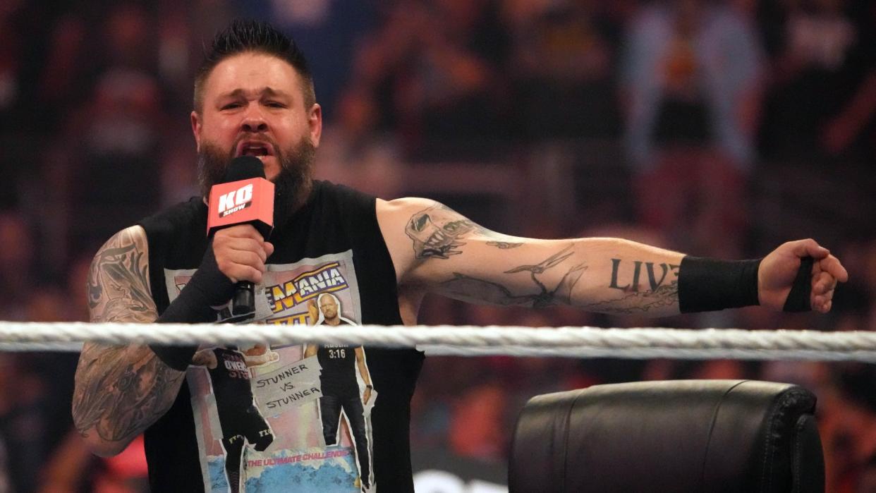 WWE star Kevin Owens brought the Vancouver crowd to its feet when he entered the ring wearing a Canucks jersey, courtesy of big fan Bruce Boudreau. (Reuters)