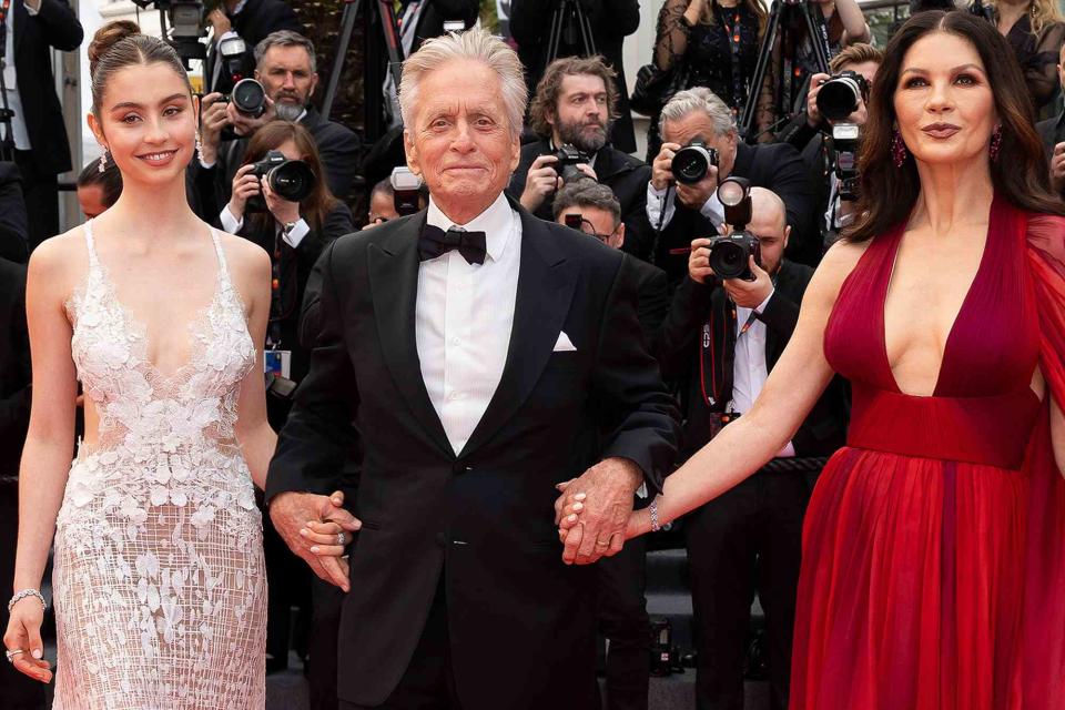 <p> Marc Piasecki/FilmMagic</p> Michael Douglas (middle) and Catherine Zeta-Jones (right) with their daughter Carys (left)