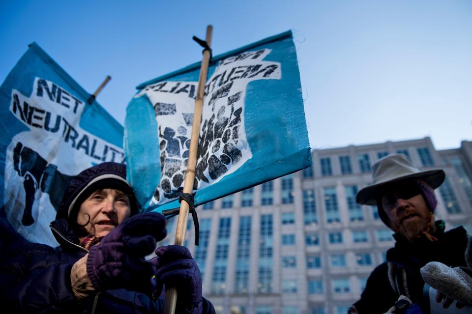 Protesters rally at FCC against repeal of net neutrality rules