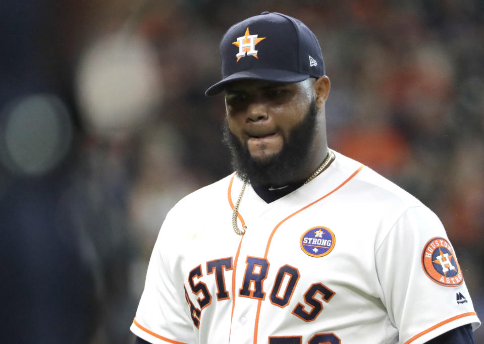 Houston Astros relief pitcher Francis Martes walks toward the dugout after being pulled during the eighth inning of a baseball game against the Seattle Mariners Saturday, Sept. 16, 2017, in Houston. (AP Photo/David J. Phillip)