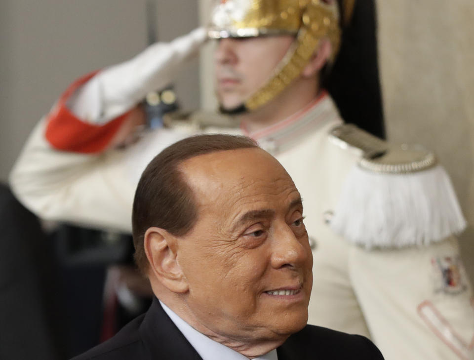 Forza Italia party leader Silvio Berlusconi leaves after meeting Italian President Sergio Mattarella, in Rome, Thursday, Aug. 22, 2019. President Sergio Mattarella continued receiving political leaders Thursday, to explore if a solid majority with staying power exists in Parliament for a new government that could win the required confidence vote. (AP Photo/Alessandra Tarantino)