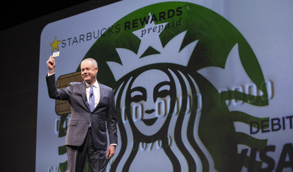 SEATTLE, WA - MARCH 23: Starbucks COO Kevin Johnson introduces the Starbucks Rewards Prepaid Visa Debit Card during the Starbucks Annual Shareholders Meeting on March 23, 2016 in Seattle, Washington. The company also reported on its expansion in China. (Photo by Stephen Brashear/Getty Images)