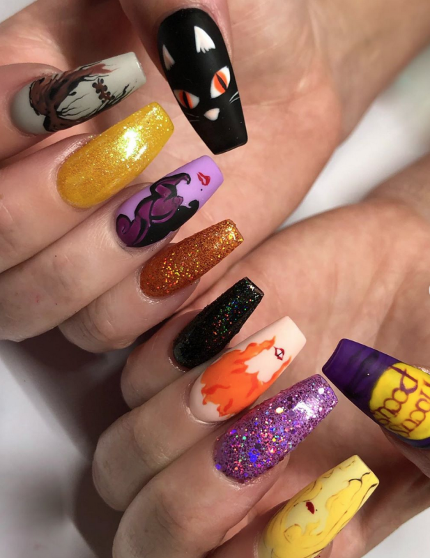 <p>@nailz_by_dev</p><p>This witchy wonder by <a href="https://www.instagram.com/nailz_by_dev/" rel="nofollow noopener" target="_blank" data-ylk="slk:@nailz_by_dev;elm:context_link;itc:0;sec:content-canvas" class="link ">@nailz_by_dev</a> has us wishing we were a part of the Sanderson sisters!</p>