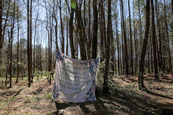 PHOTO: A banner is displayed along the South River Trail in Atlanta, Georgia, on March 4, 2023, near the site where a proposed public safety training center will be constructed. (Alyssa Pointer/Reuters)