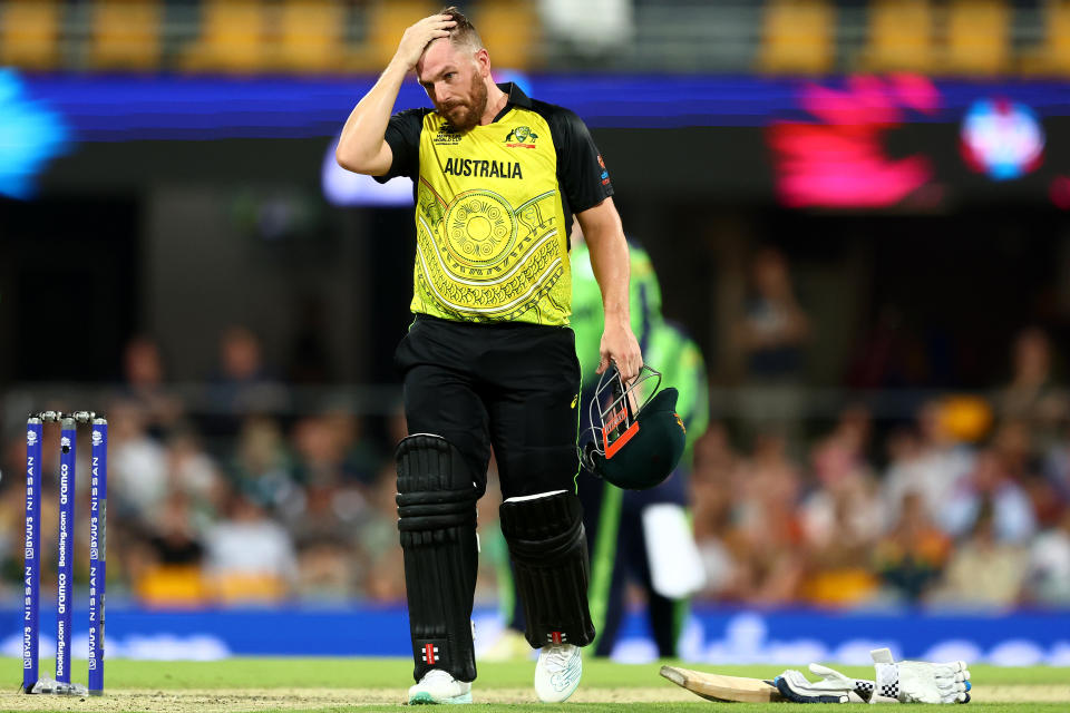 BRISBANE, AUSTRALIA - OCTOBER 31: Aaron Finch of Australia reacts after the wicket of Mitchell Marsh of Australia during the ICC Men's T20 World Cup match between Australia and Ireland at The Gabba on October 31, 2022 in Brisbane, Australia. (Photo by Chris Hyde-ICC/ICC via Getty Images)