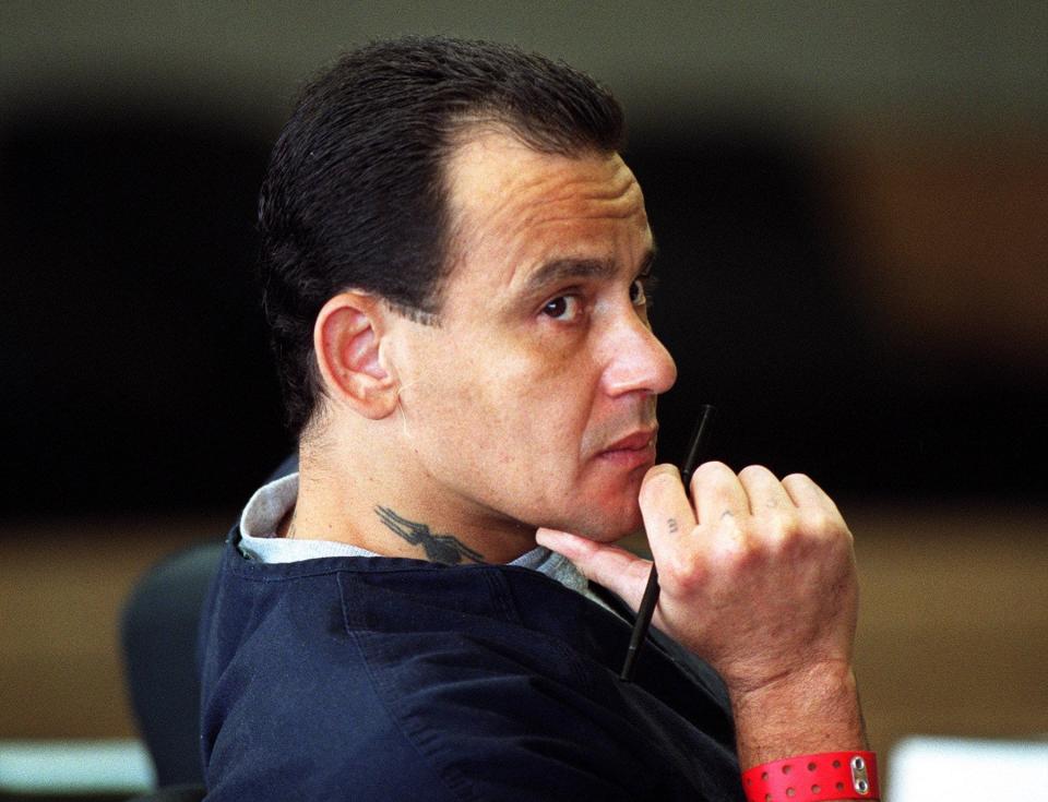 WEST PALM BEACH. Norberto Pietri in court Tuesday in West Palm Beach in 2002. A tattoo of a spider can be seen on his neck by his collar.  Pietri is on Death Row because he killed West Palm Beach police officer Brian Chappell in 1988.