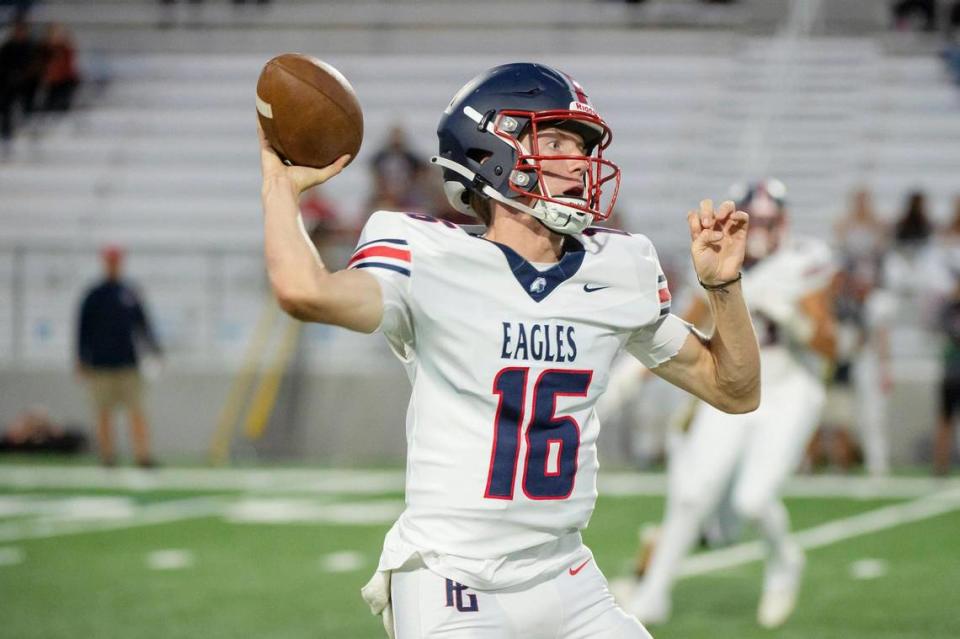 Pleasant Grove Eagles quarterback Cole Davis (16) passes the ball downfield for a first down in the first half during the game on Friday at West Park High School in Roseville.