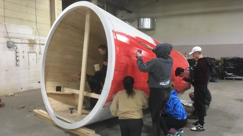 Hug Mug hut lets skaters step into giant cup of hot chocolate at The Forks