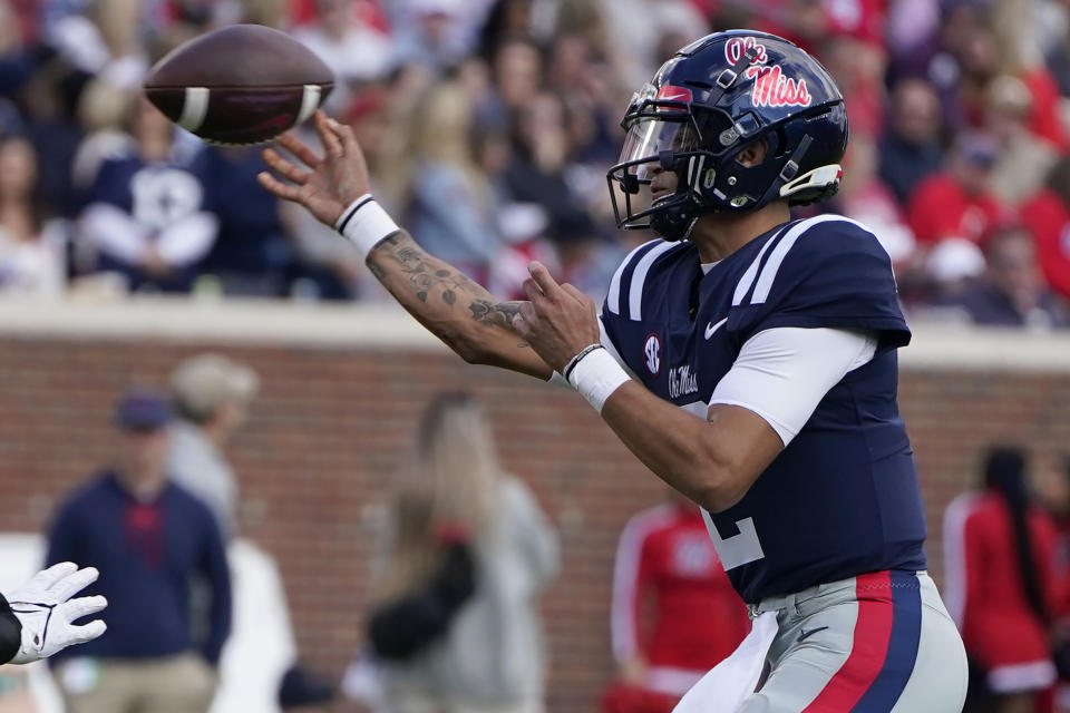 Mississippi quarterback Matt Corral (2) passes against Liberty in a 27-14 victory. (AP Photo/Rogelio V. Solis)