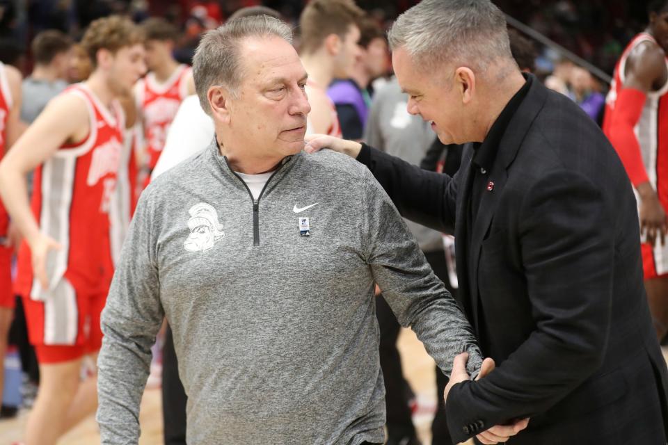 Michigan State Spartans head coach Tom Izzo congratulates head coach for the Buckeyes Chris Holtmann after the 68-58 loss to the Ohio State Buckeyes in the Big Ten tournament quarterfinals at United Center in Chicago on Friday, March 10, 2023.