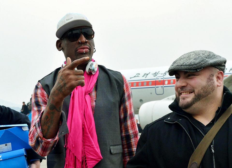 Former NBA basketball star Dennis Rodman arrives at Pyongyang airport in Pyongyang