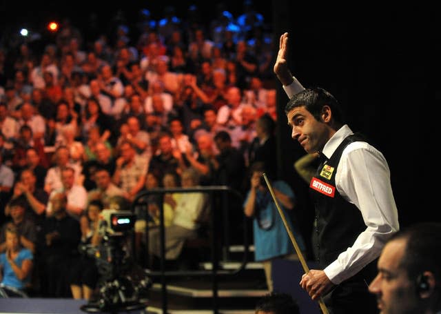 Ronnie O’Sullivan waves to the crowd at the Crucible