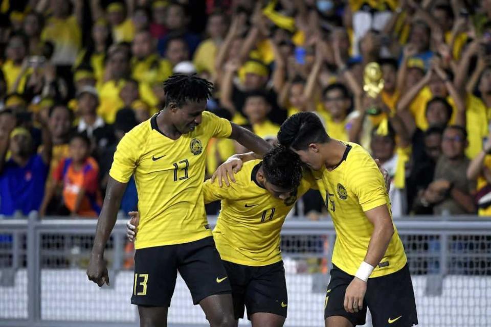 Muhammad Safawi Rasid celebrating with his teammates after scoring against Indonesia. — Bernama pic