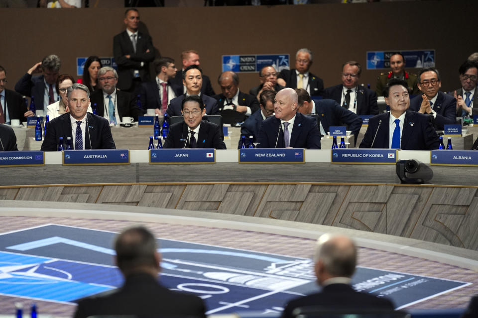 From left, Australia's Deputy Prime Minister Richard Marles, Japan's Prime Minister Fumio Kishida, New Zealand's Prime Minister Christopher Luxon, and South Korea's President Yoon Suk Yeol, attend a session of the NATO summit with Indo-Pacific Partners, Thursday, July 11, 2024, in Washington. (AP Photo/Matt Rourke)