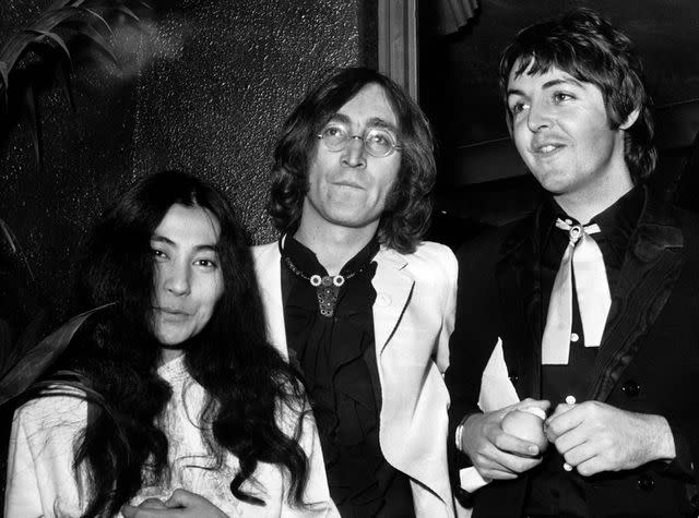 <p>Keystone-France/Gamma-Keystone via Getty</p> Yoko Ono, John Lennon and Paul McCartney at the 'Yellow Submarine' film opening