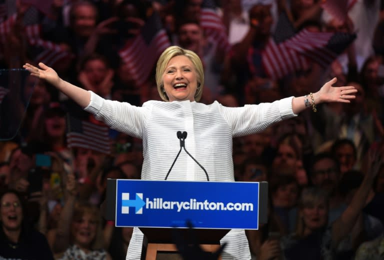 Democratic presidential candidate Hillary Clinton acknowledges celebratory cheers from the crowd during her primary night event at the Duggal Greenhouse, Brooklyn Navy Yard, June 7, 2016 in New York