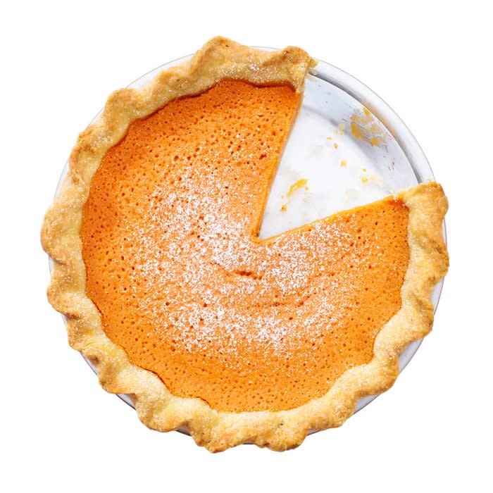 Overhead view of sweet potato pie with slice removed