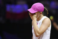 Poland's Iga Swiatek during the women's singles semifinal match against Kazakhstan's Elena Rybakina at the WTA Tour in Stuttgart, Germany, Saturday April 20, 2024. (Marijan Murat/dpa via AP)