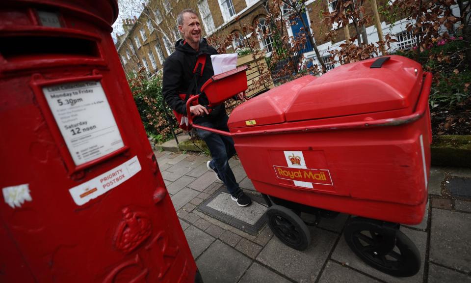 <span>Six-day-a-week Royal Mail deliveries are ‘no longer financially viable’, the Communication Workers Union has appeared to concede. </span><span>Photograph: Andy Rain/EPA</span>